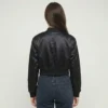 Black cropped satin jacket back.