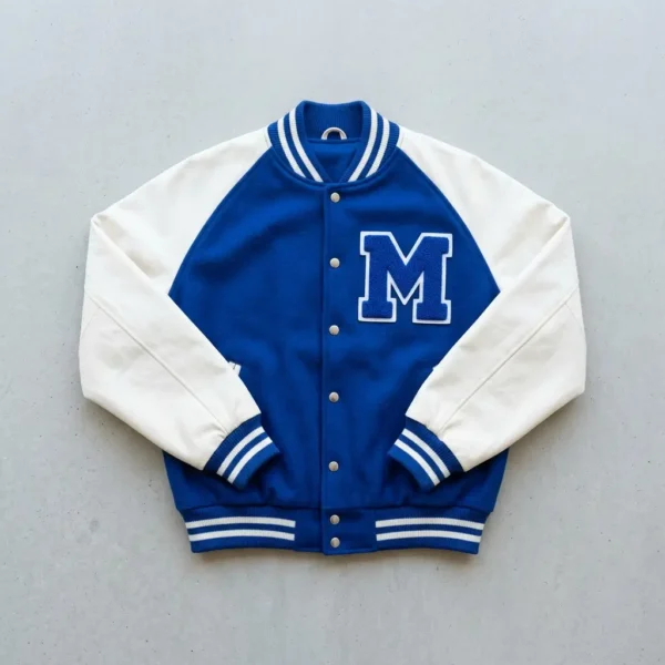 Blue wool body white leather raglan sleeves letterman jacket.