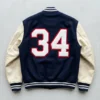 Chenille number varsity patches on the back of letterman jacket.