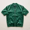 Green short sleeve satin bomber jacket.