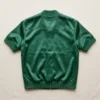 Green short sleeve satin bomber jacket back.