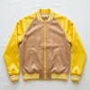 Light brown body and yellow raglan sleeves satin varsity jacket.