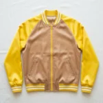 Light brown body and yellow raglan sleeves satin varsity jacket.