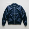 Navy blue satin ma‑1 flight bomber jacket.