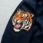 Roaring tiger embroidered varsity mascot patch.