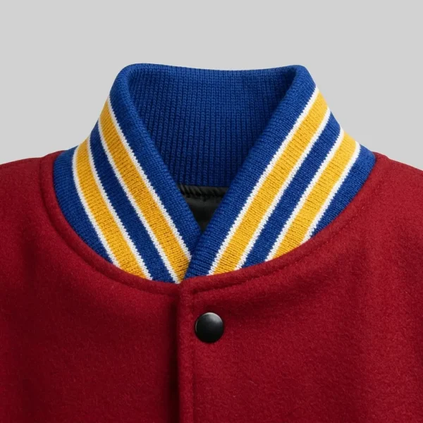 Stand-up knit collar varsity jacket.