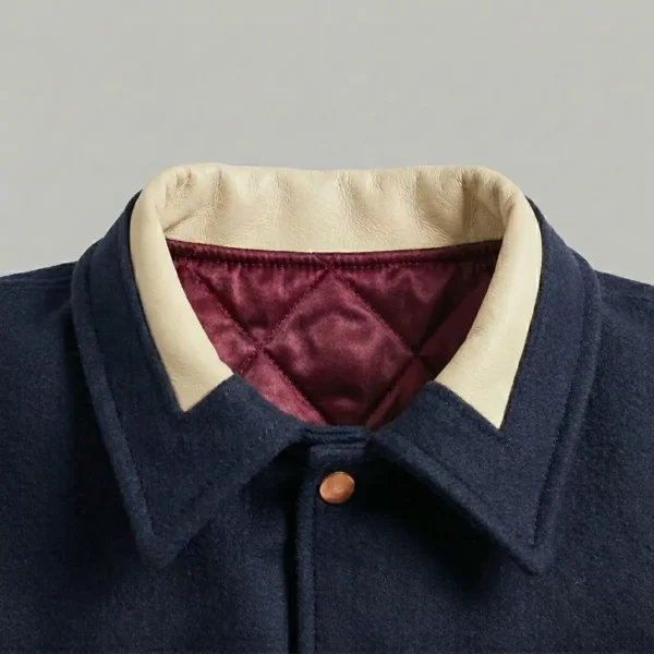 Wool collar leather insert.