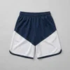 Custom navy and white two-tone basketball shorts back.