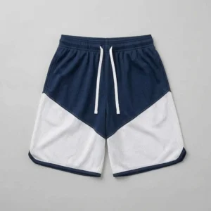 Custom navy and white two-tone basketball shorts front.