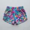 Back view of custom sublimated booty shorts with all-over abstract floral pattern printed.