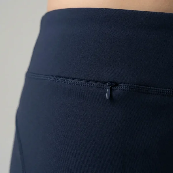 Closeup side view of custom booty shorts with invisible zippered pocket.