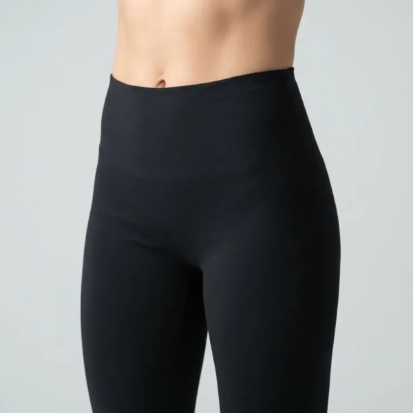 Front view of high-rise black booty shorts with no pockets.