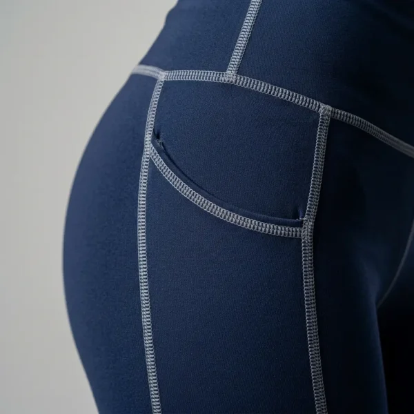 Closeup side view of spandex custom booty shorts with side pocket.