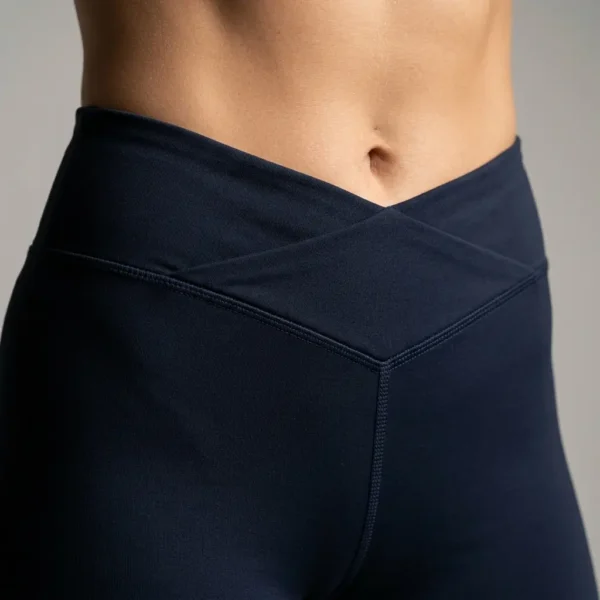 Closeup of v-cut waistband custom booty shorts.