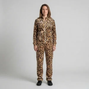 Front view of a woman wearing caramel cream leopard print velour tracksuit.