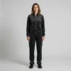 Front view of a woman wearing charcoal abstract leopard print velour tracksuit.