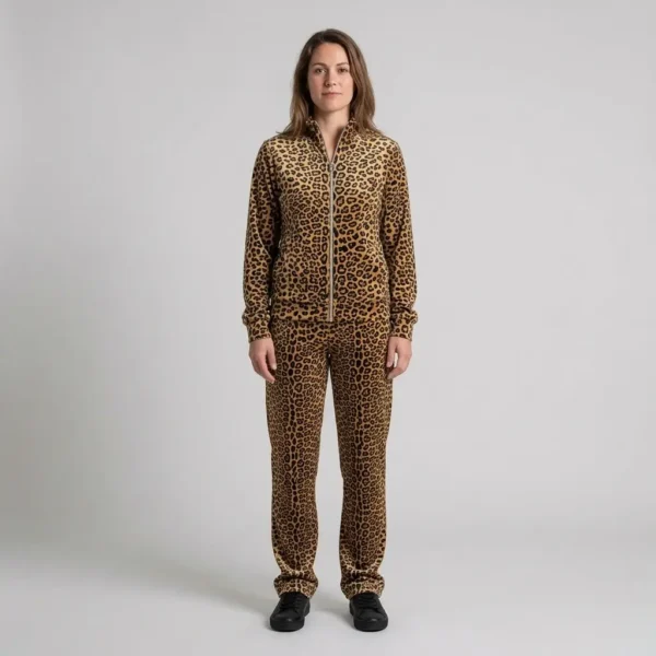 Front view of a woman wearing classic tan leopard print velour tracksuit.
