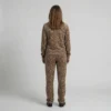 Back view of a woman wearing cream brown leopard print velour tracksuit.