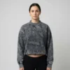 Cropped acid washed mock neck sweatshirt front.