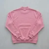 Pink embossed mock neck sweatshirt back.