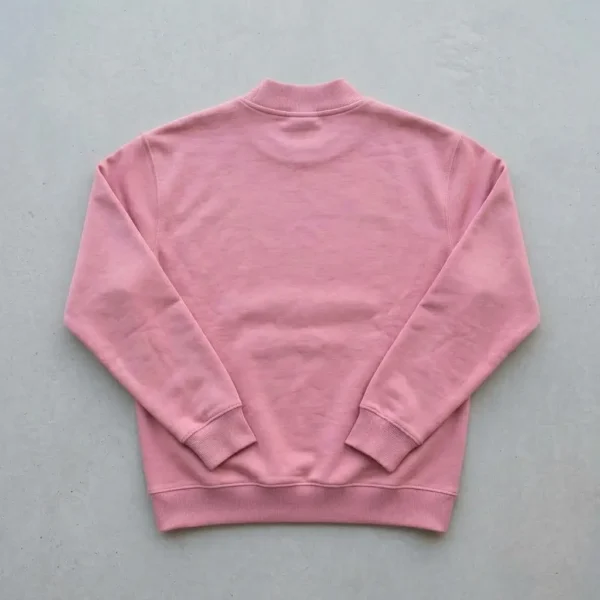Pink embossed mock neck sweatshirt back.