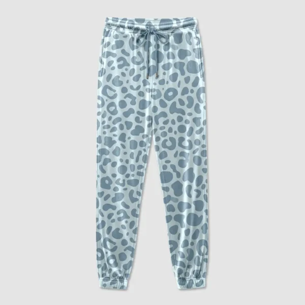 Powder blue leopard print tapered leg velour track pants.