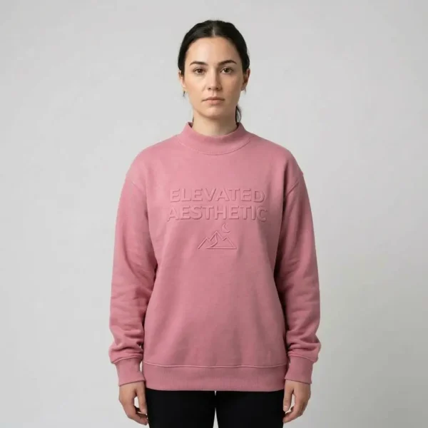 Regular fit pink embossed mock neck sweatshirt.