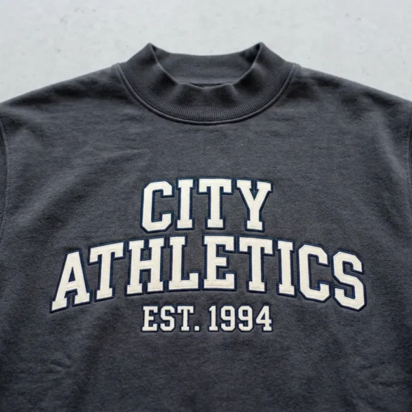 Tackle twill mock neck sweatshirt closeup.