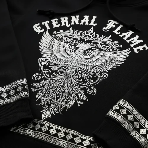 metallic-ink-printed-hoodie Black hoodie with "ETERNAL FLAME" and a highly detailed white phoenix graphic, accented by silver metallic ink trim on the cuffs and hem.